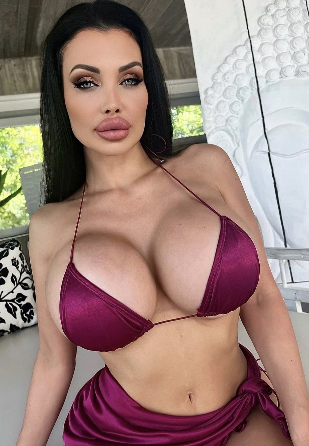 Looking amazing in a tiny bikini top