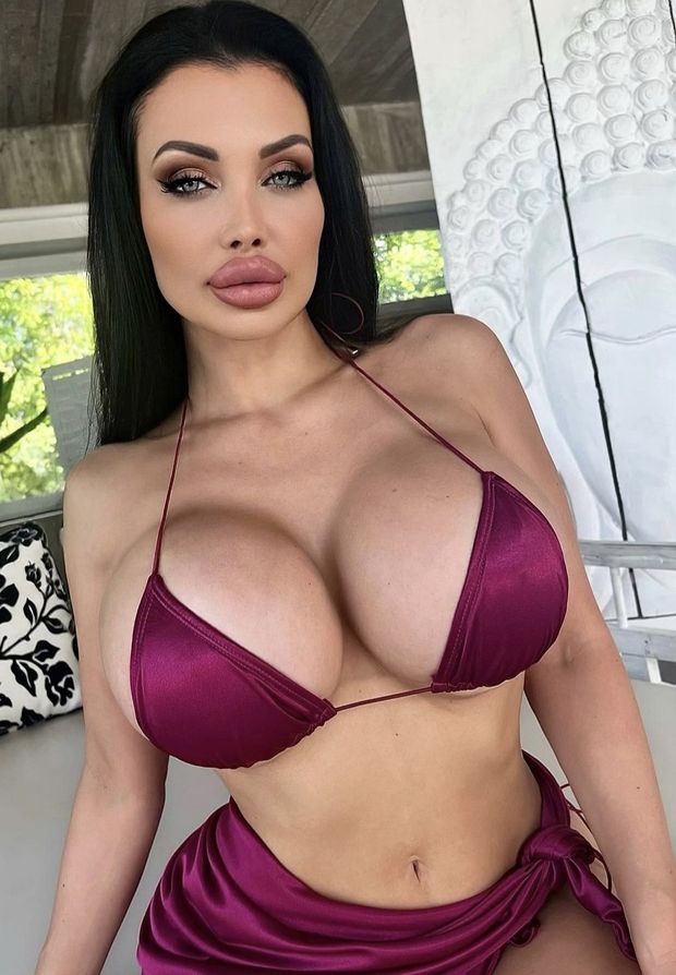 Looking amazing in a tiny bikini top