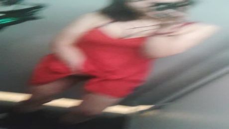 excited teenage in a public fitting room