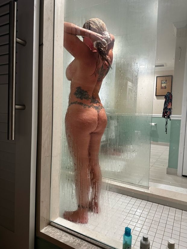 Who's shower is she in?