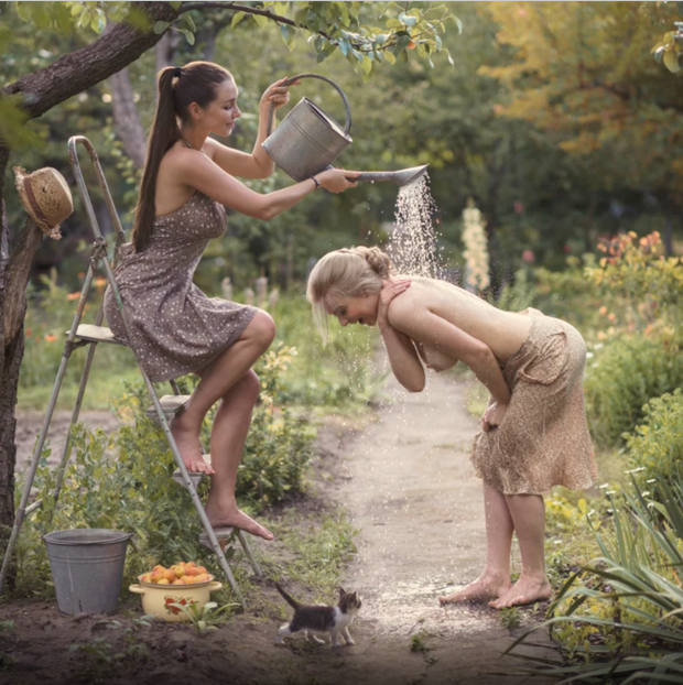 Helping her bathe