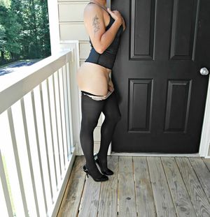 On the balcony in heels