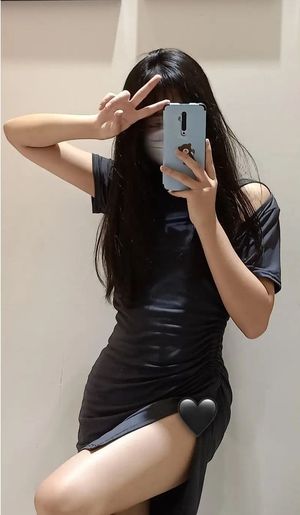Chinese teen slut in black dress posing for cum tribute