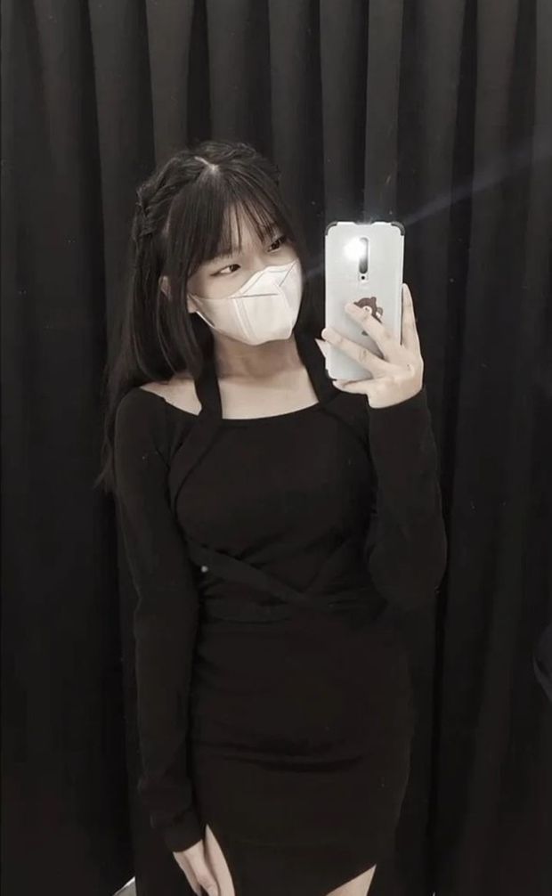 Chinese bitch in sexy black dress hoping to get some horny cocks for her cum tribute