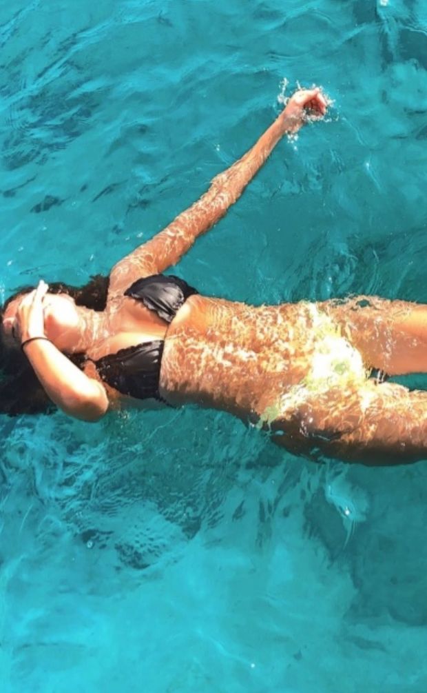 Sexy babe swimming