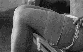 She slowly takes off her panties as you walk through the door