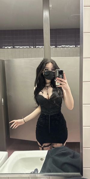 Goth teen with glasses