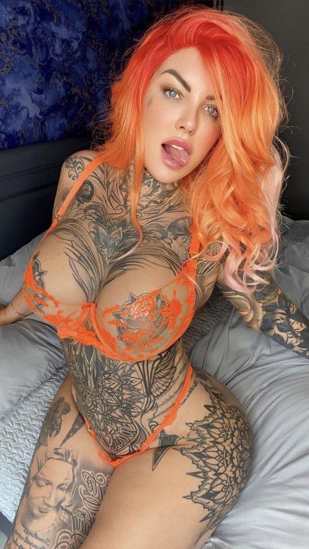 Sexy Tattooed Redhead Babe
