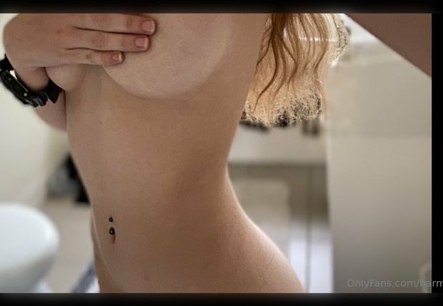 Blonde teen covering tits