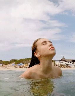 teen jumps naked out of water