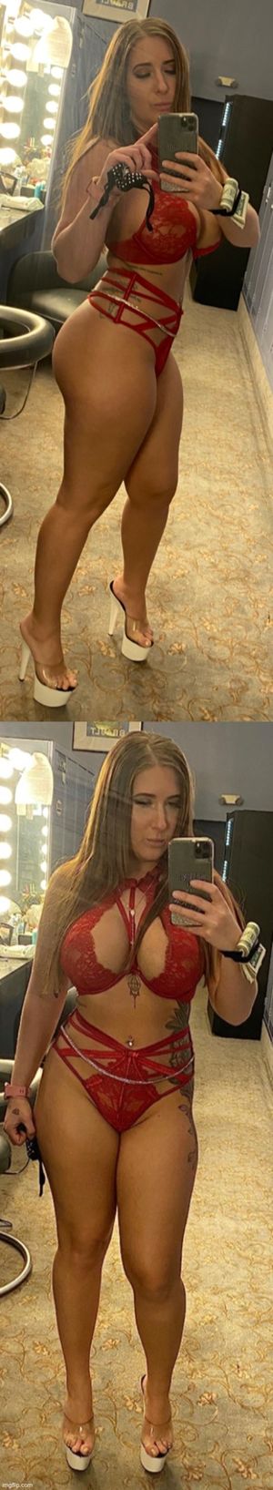 Gorgeous bitch in red lingerie. Her tits are fantastic.