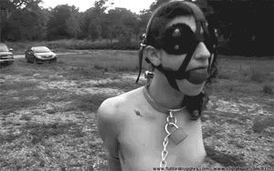 Slave blinded gagged & leashed