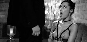 Obedient slave sticks tongue out for master