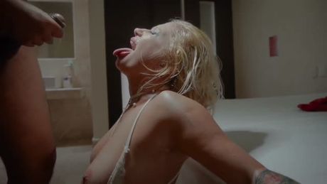 Blonde amateur takes a huge cumshot facial (slow motion)