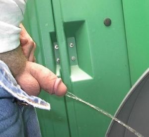 Phat cock peeing in the men's room