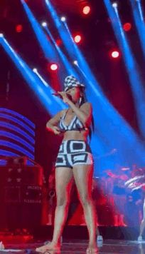 Sexy as fuck Janelle Monae flashing her titty at a concert