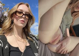 Gorgeous redhead pulling her panties aside exposing her perfect pussy