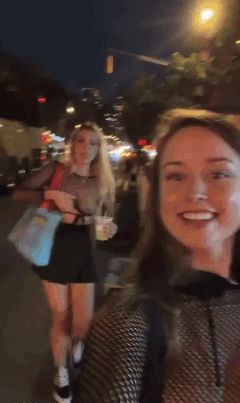 drunk partygoer pulls up skirt in public