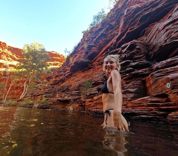 Stunning blonde getting wet