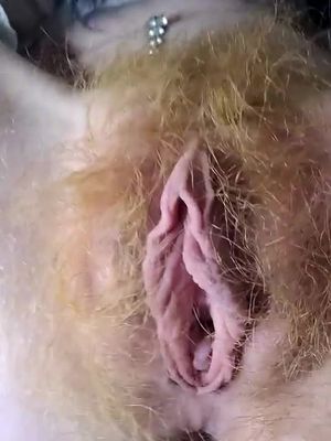 playing with her hairy pussy