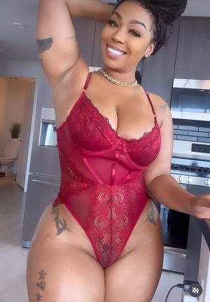 Sexy ebony queen in hot red lingerie one piece