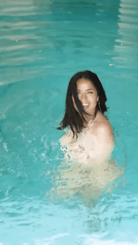 Salma Hayek showing off at the pool