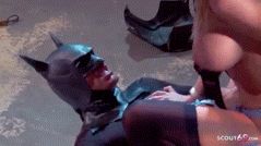 Batman is rewarded by two hot bimbos
