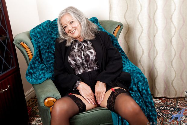 Charming Chubby Granny in Stockings Shows Sexy Lingerie and Plays with Herself.