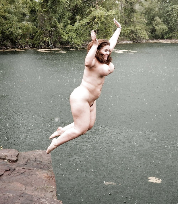 London Andrews about to dive into the lake.