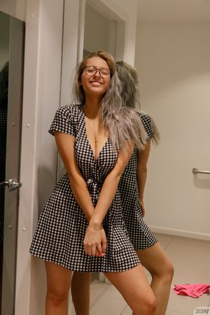 Glasses and a polka dot dress