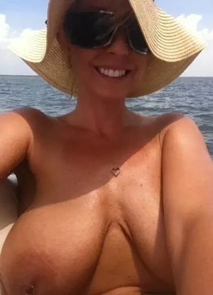 " I know they're enormous up close but your cock's hard and thick enough to tame them if you rest your balls on my stomach-crease."