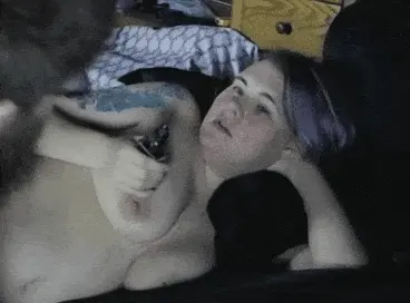 Kitty smoking in bed