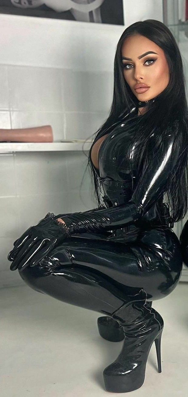 Evil Woman in Black Latex...