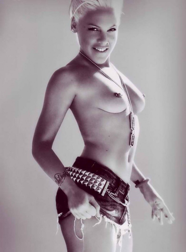 Pink posing topless.