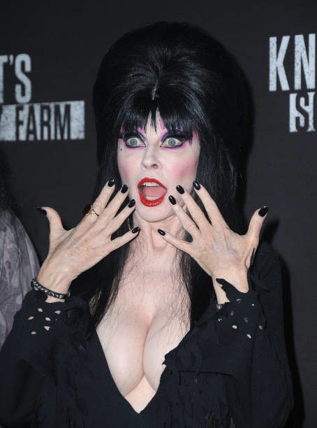 Elvira watches you jack off