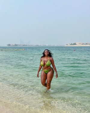 Shani Jamilah in a Green bikini