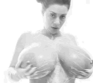 Linsey Dawn McKenzie soaping up her breasts