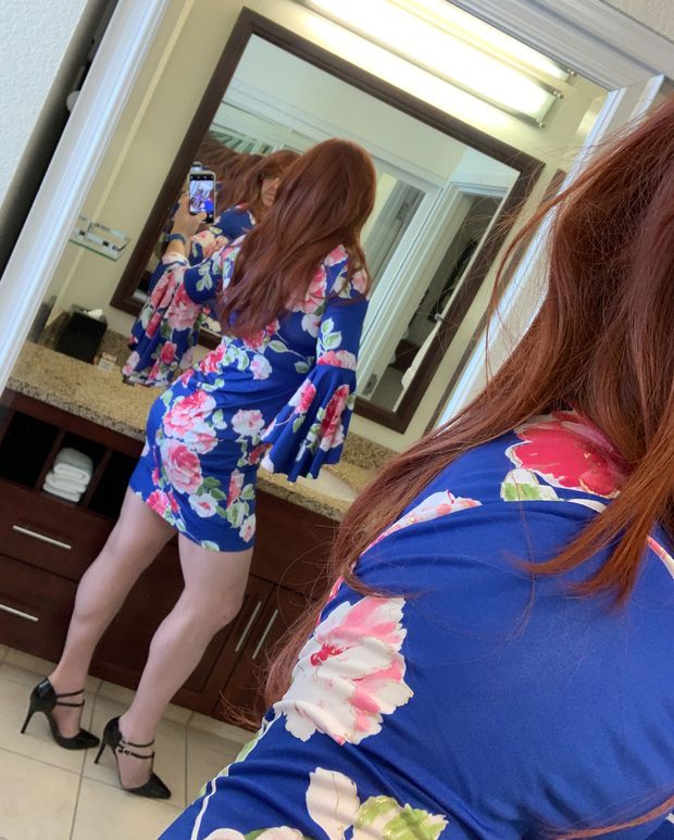 One of many floral dress mirror selfies