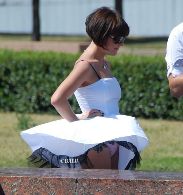 Wind, meet skirt. Skirt meet the elbows. Panties, meet the world!