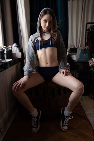 black converse and hoodie