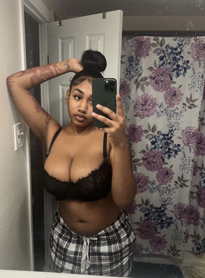 Cute Black chick in Black bra and pajamas