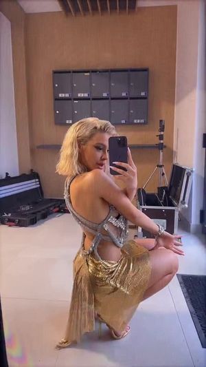 Ema Radujko teasing in sexy dress without panties