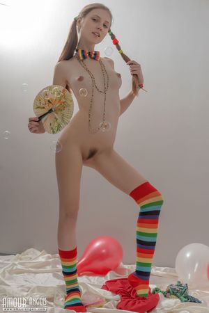 Skinny blonde in pigtails