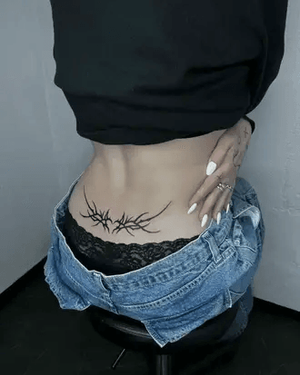 Tattoo on lower back