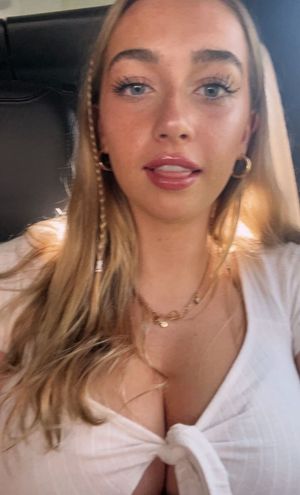 Quincy white top cleavage close up