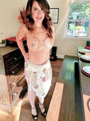 Paris lends a hand in the kitchen and then gets undressed