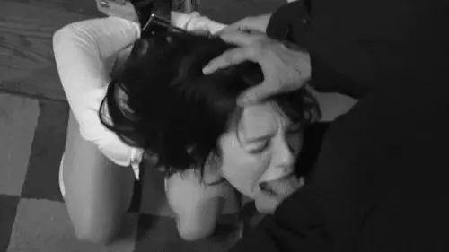 MILF on her knees wrists bound behind her back used for pleasure