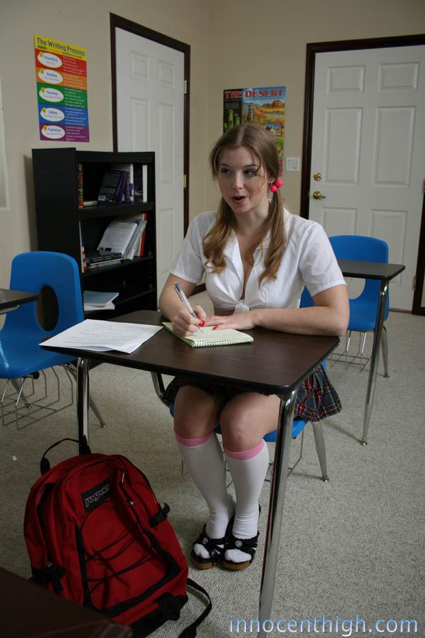 Cosplay in white kneesocks and plaidskirt