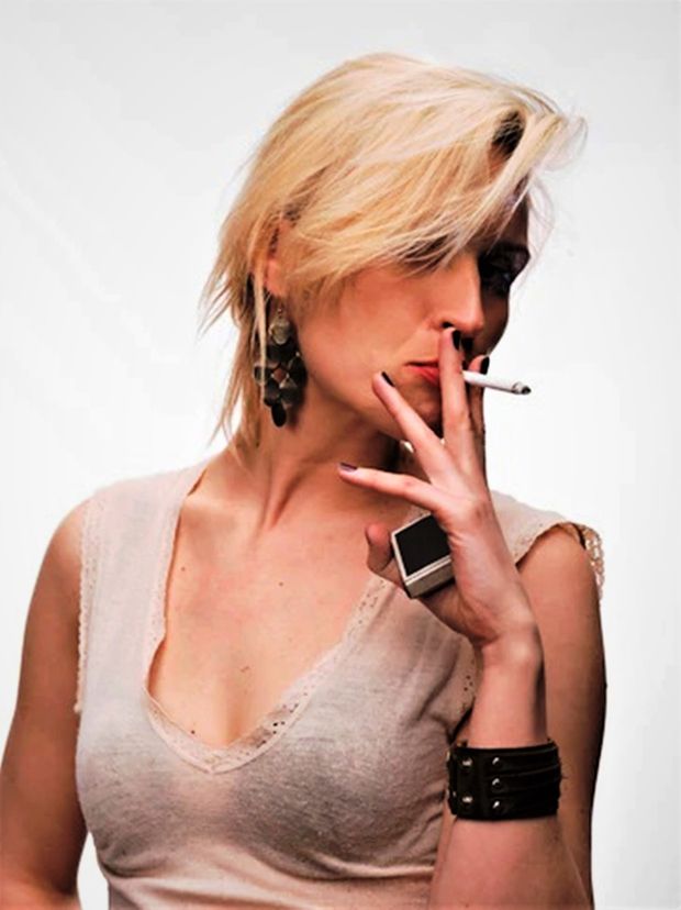 This wife of twenty years and mother of four still loves fucking anytime she can!  Here she is having a smoke before she fucks her son!