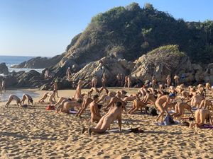 Naked exercise on the beach